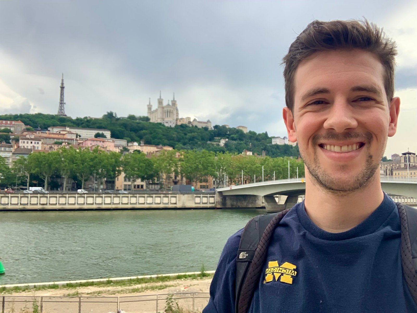 Matt in Lyon with Fourvière Basilica in the background